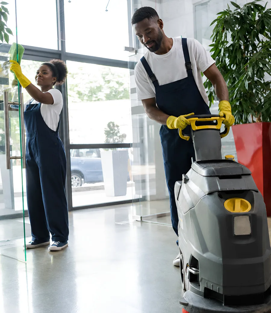 Cleaning professionals at work in a bright interior
